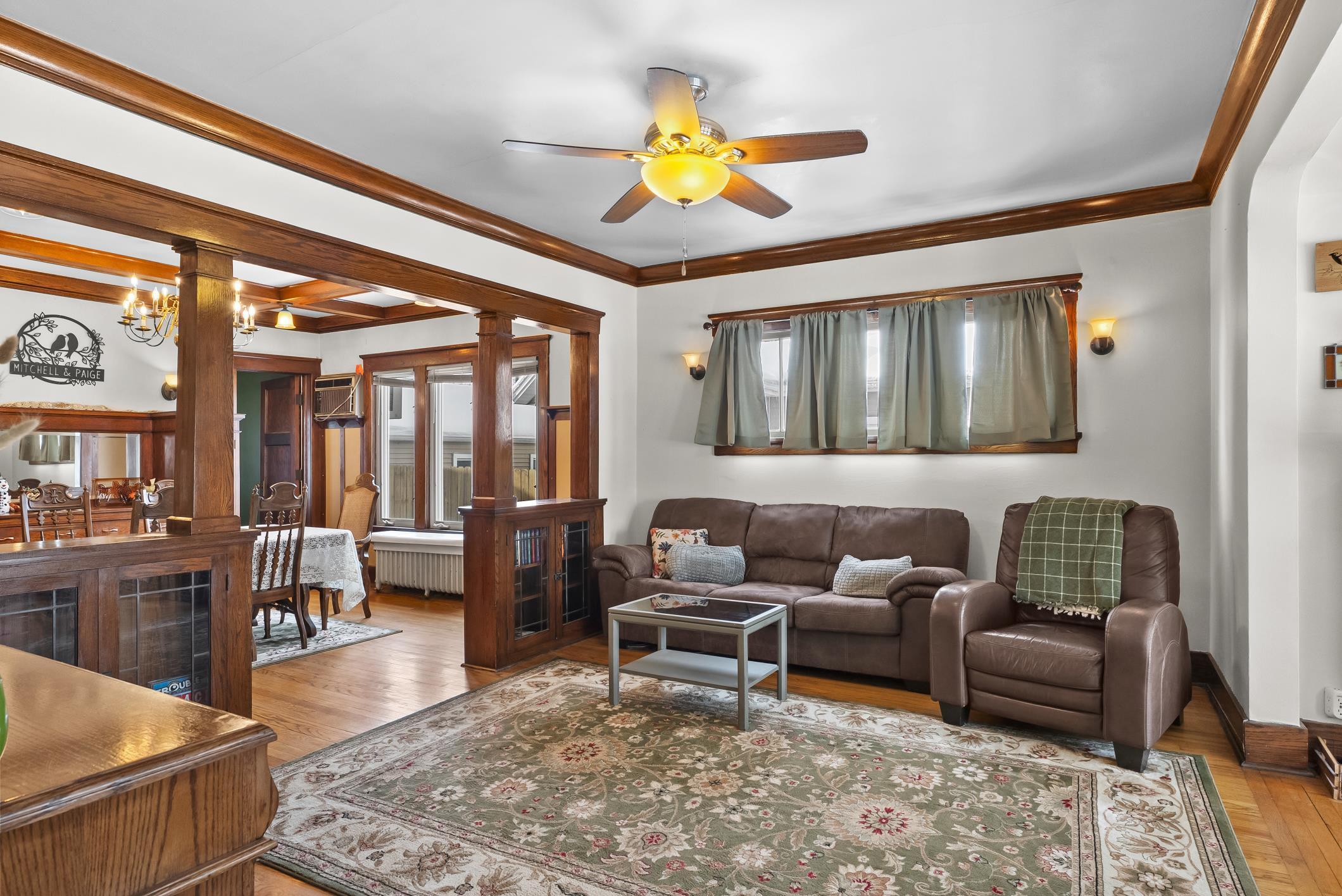 1617 Madison Street Manitowoc, WI 54220 - Photo 6 of 34 Spacious area open to dining and also to the sitting area on the front of the house.