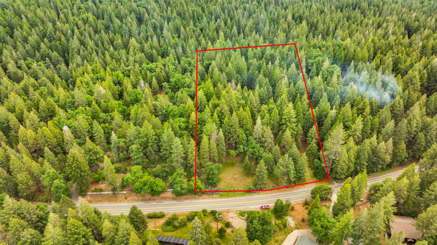 14647 Banner Quaker Hill Road Nevada City, CA 95959 - Photo 3 of 43 a view of a yard with wooden fence