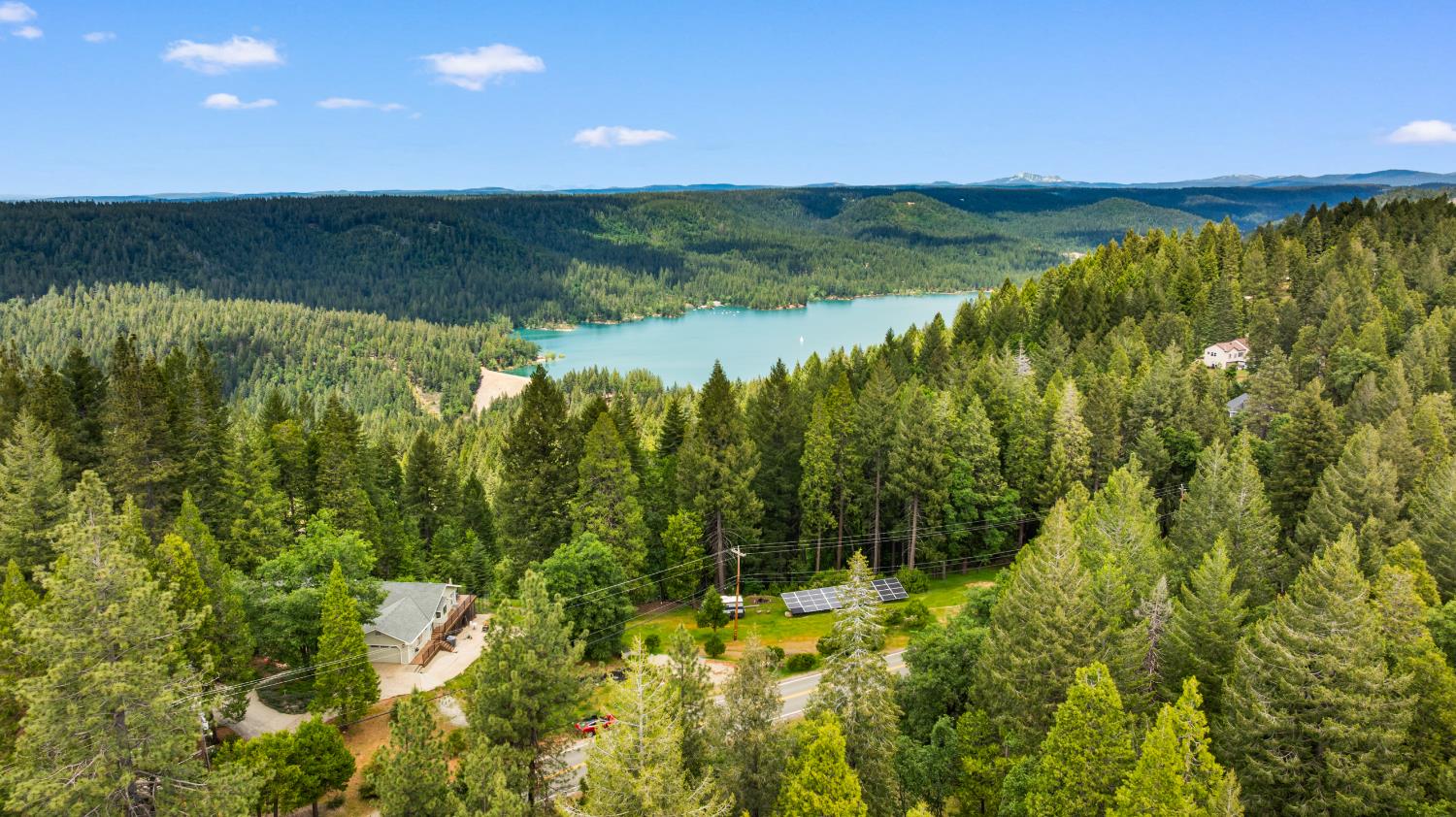 14647 Banner Quaker Hill Road Nevada City, CA 95959 - Photo 7 of 43 a view of a lake from a yard