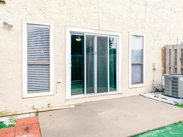 a view of a house with a patio