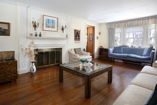 41 Sheldon Road Newton, MA 02459 - Photo 3 of 7 a living room with furniture and a fireplace