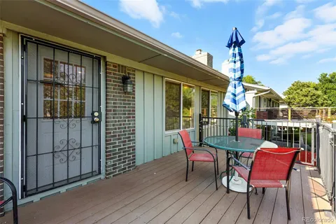 a view of a chairs on the roof deck