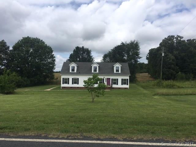 1903 Tom Williams Road Monroe, NC 28112 - Photo 1 of 22 a front view of a house with garden