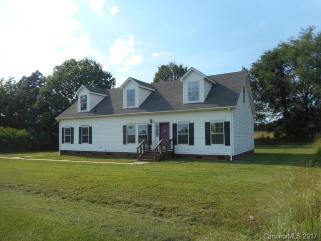 1903 Tom Williams Road Monroe, NC 28112 - Photo 2 of 22 a view of a house with a yard