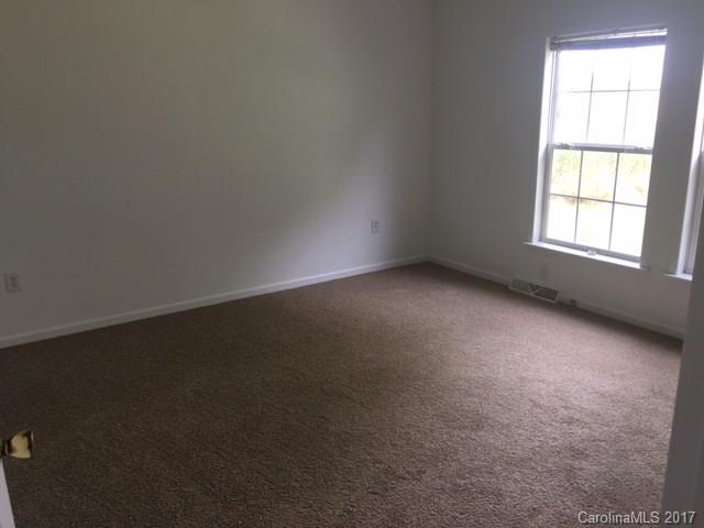 1903 Tom Williams Road Monroe, NC 28112 - Photo 11 of 22 an empty room with a window