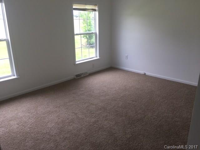 1903 Tom Williams Road Monroe, NC 28112 - Photo 12 of 22 an empty room with a window