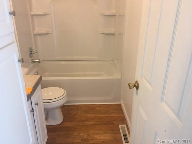 1903 Tom Williams Road Monroe, NC 28112 - Photo 13 of 22 a bathroom with a toilet and a shower