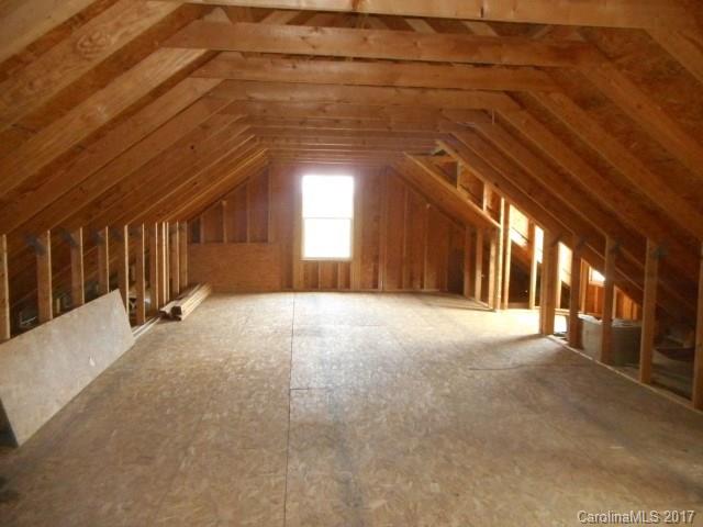 1903 Tom Williams Road Monroe, NC 28112 - Photo 16 of 22 a view of a hallway with windows