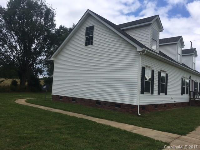 1903 Tom Williams Road Monroe, NC 28112 - Photo 3 of 22 a view of a house with a yard