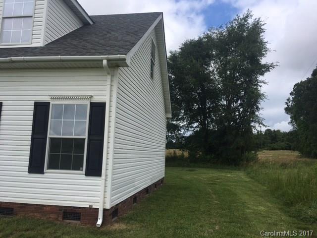 1903 Tom Williams Road Monroe, NC 28112 - Photo 4 of 22 a view of a house with a yard