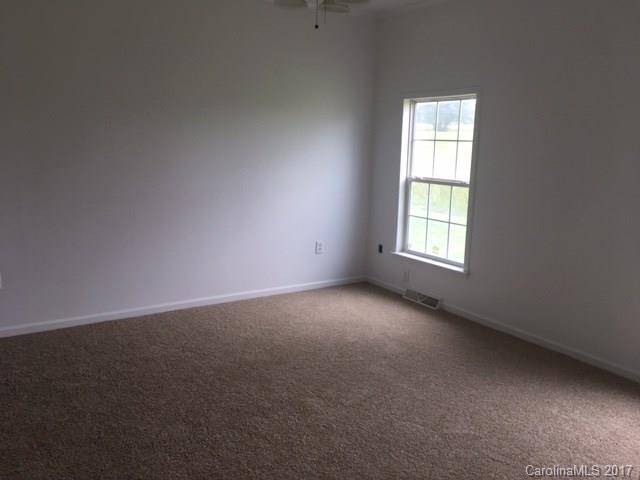 1903 Tom Williams Road Monroe, NC 28112 - Photo 8 of 22 an empty room with a window