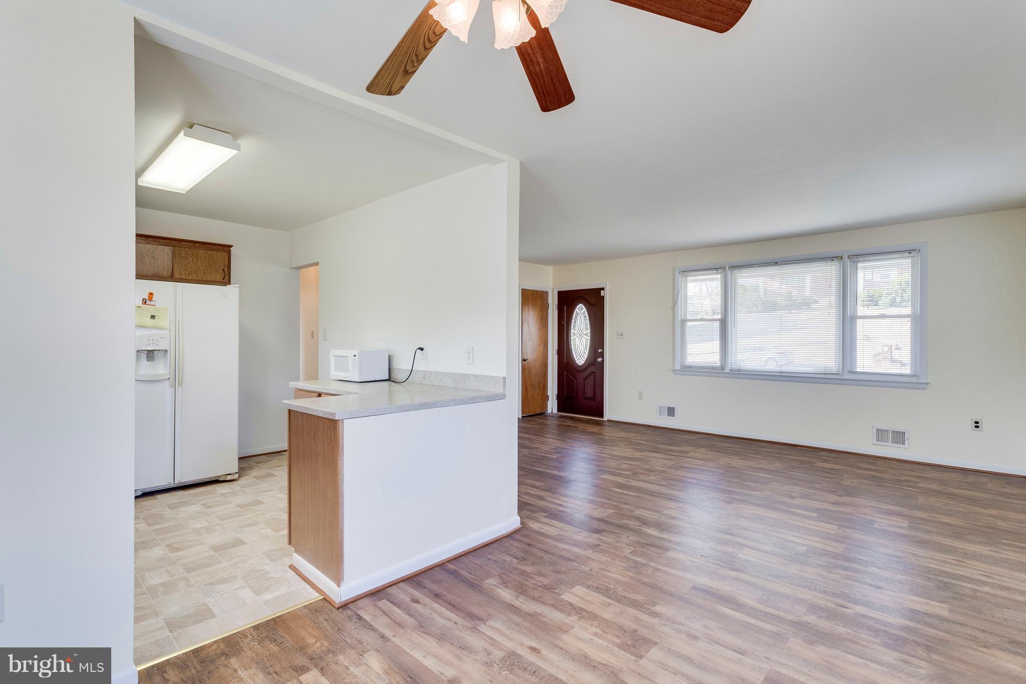 11312 Brandywine Road Clinton, MD 20735 - Photo 16 of 39 living room/ dining area