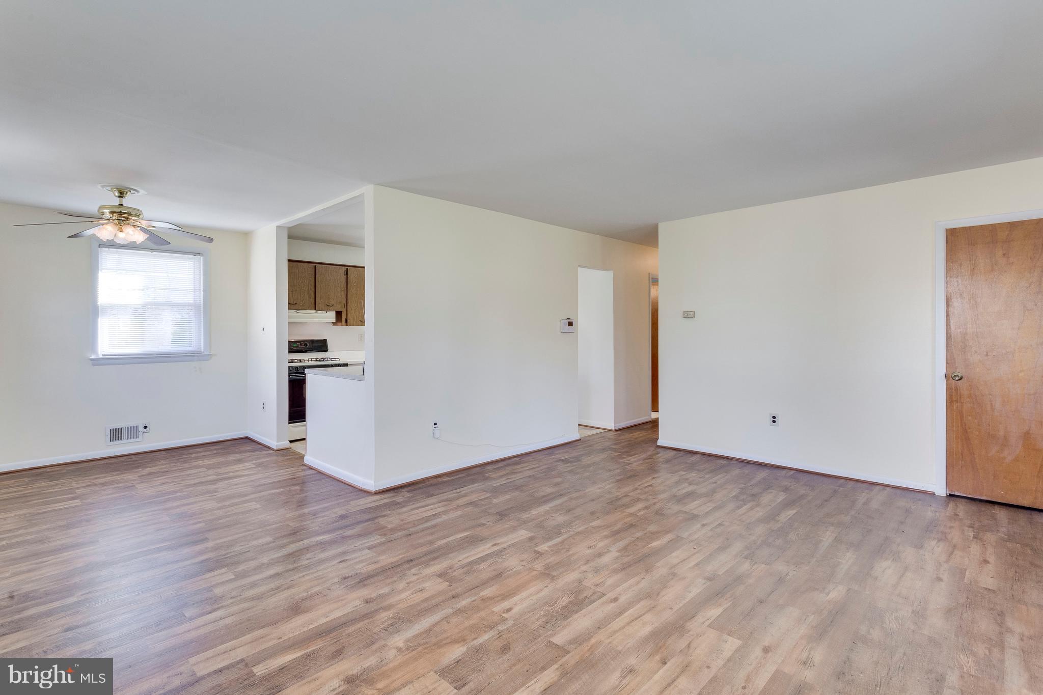 11312 Brandywine Road Clinton, MD 20735 - Photo 7 of 39 open concept living room w/ dining area