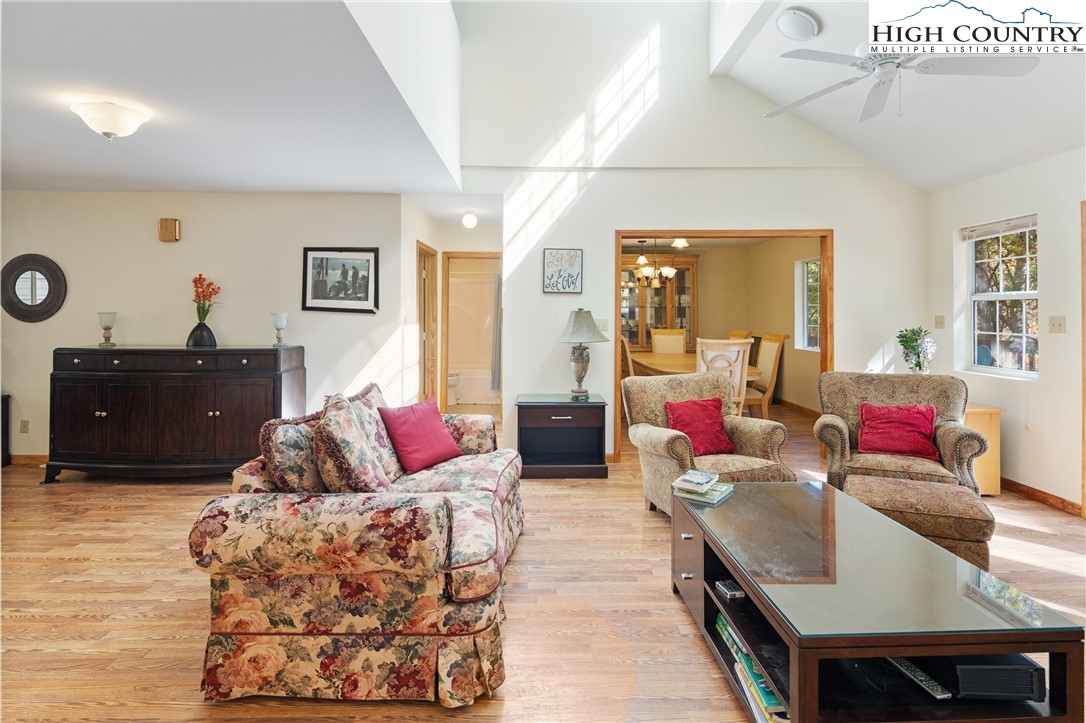 2161 Stone Mountain Road Vilas, NC 28692 - Photo 15 of 50 a living room with furniture and wooden floor