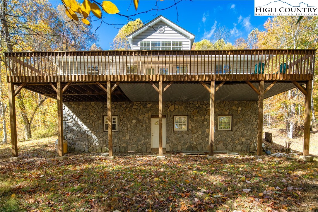 2161 Stone Mountain Road Vilas, NC 28692 - Photo 4 of 50 a view of a house with a iron gate