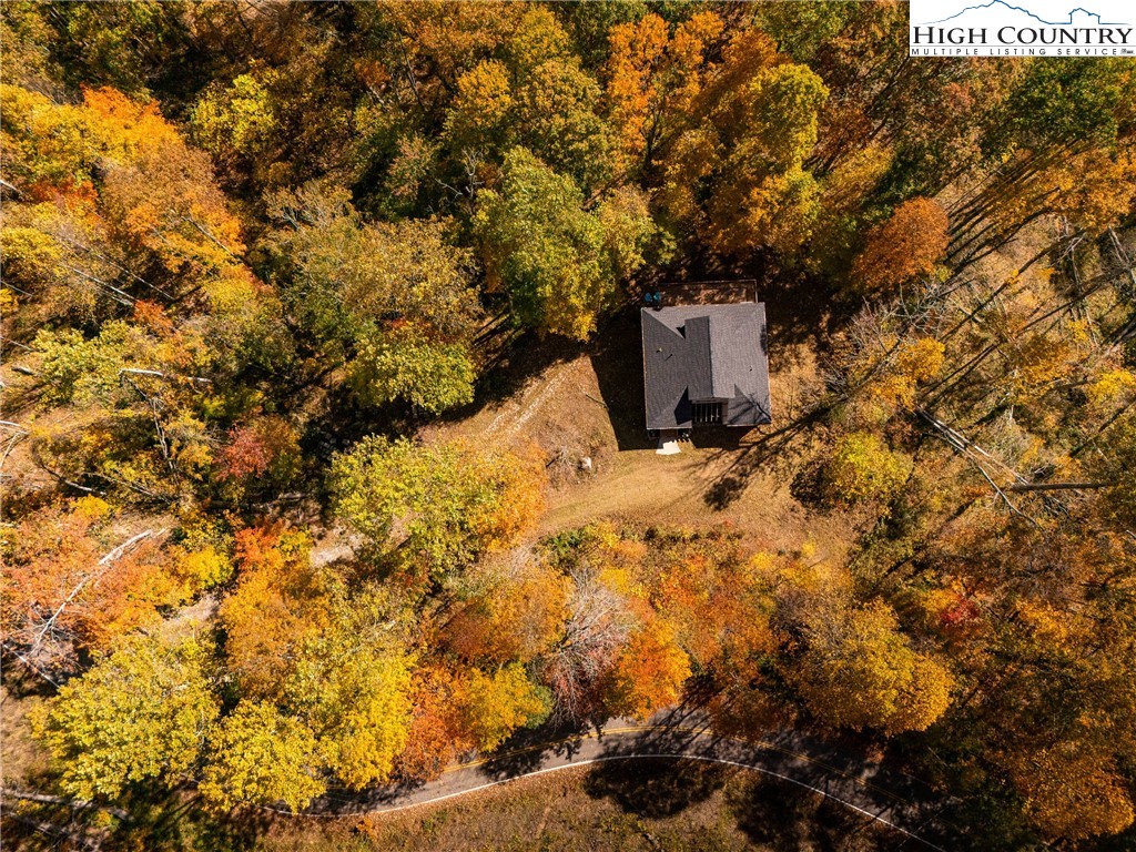 2161 Stone Mountain Road Vilas, NC 28692 - Photo 42 of 50 a view of a yard with wooden fence