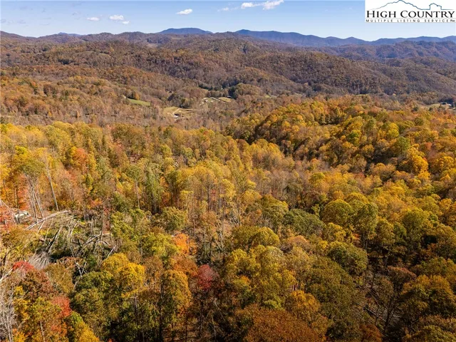 a view of an outdoor space and a mountain