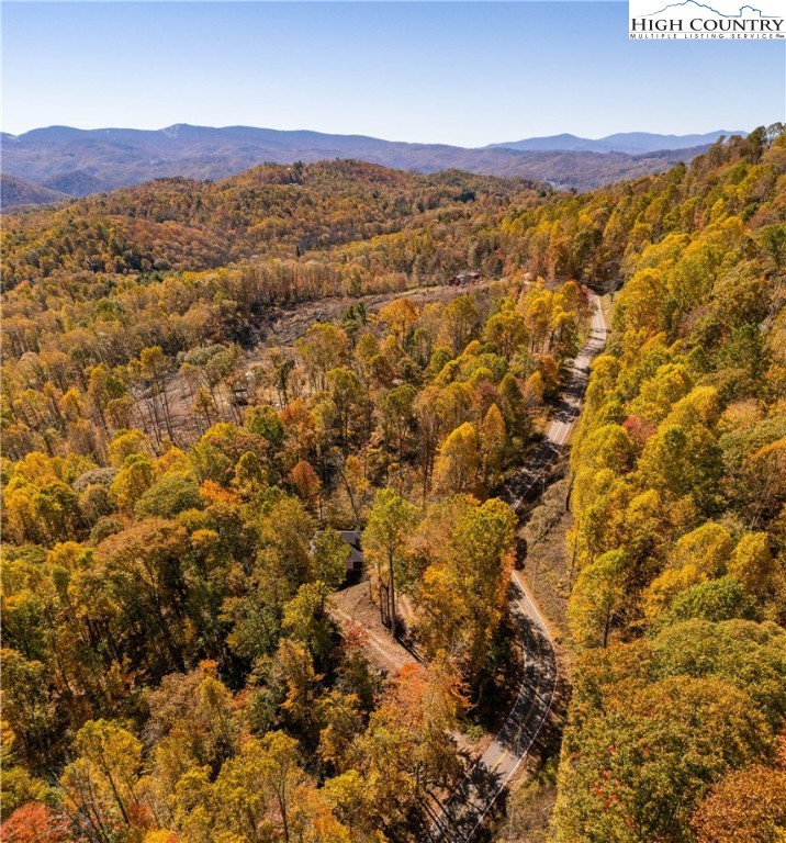 2161 Stone Mountain Road Vilas, NC 28692 - Photo 50 of 50 a view of a lush green hillside and houses