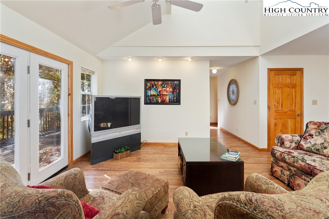 2161 Stone Mountain Road Vilas, NC 28692 - Photo 7 of 50 a living room with furniture and a flat screen tv