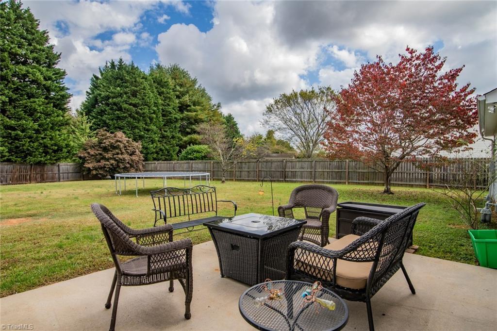 105 Stapleton Way High Point, NC 27265 - Photo 21 of 22 Patio out back with large fenced in yard