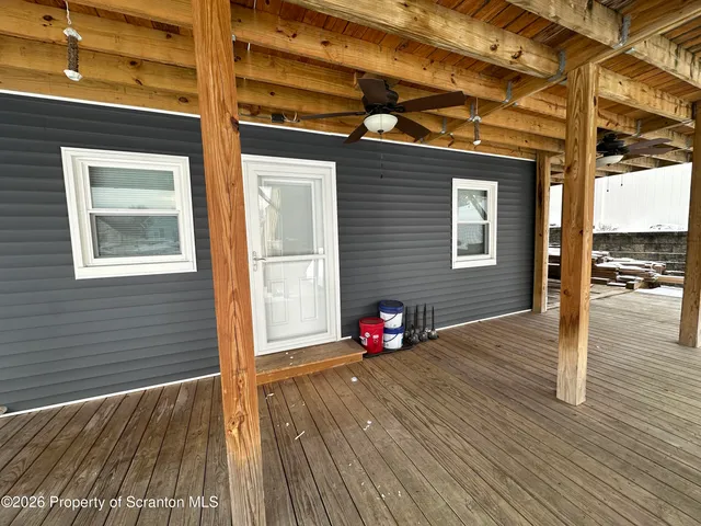 a view of a livingroom with wooden floor