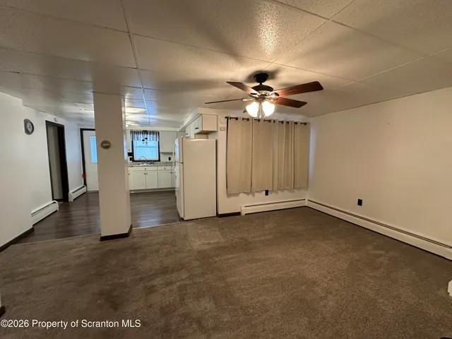 a view of a livingroom with a fireplace