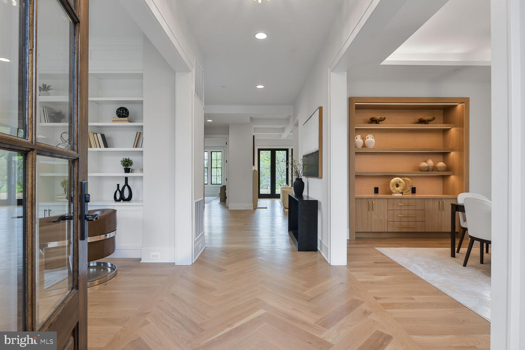 6820 Marbury Road Bethesda, MD 20817 - Photo 6 of 84 White Oak Herringbone design inlay in the Foyer