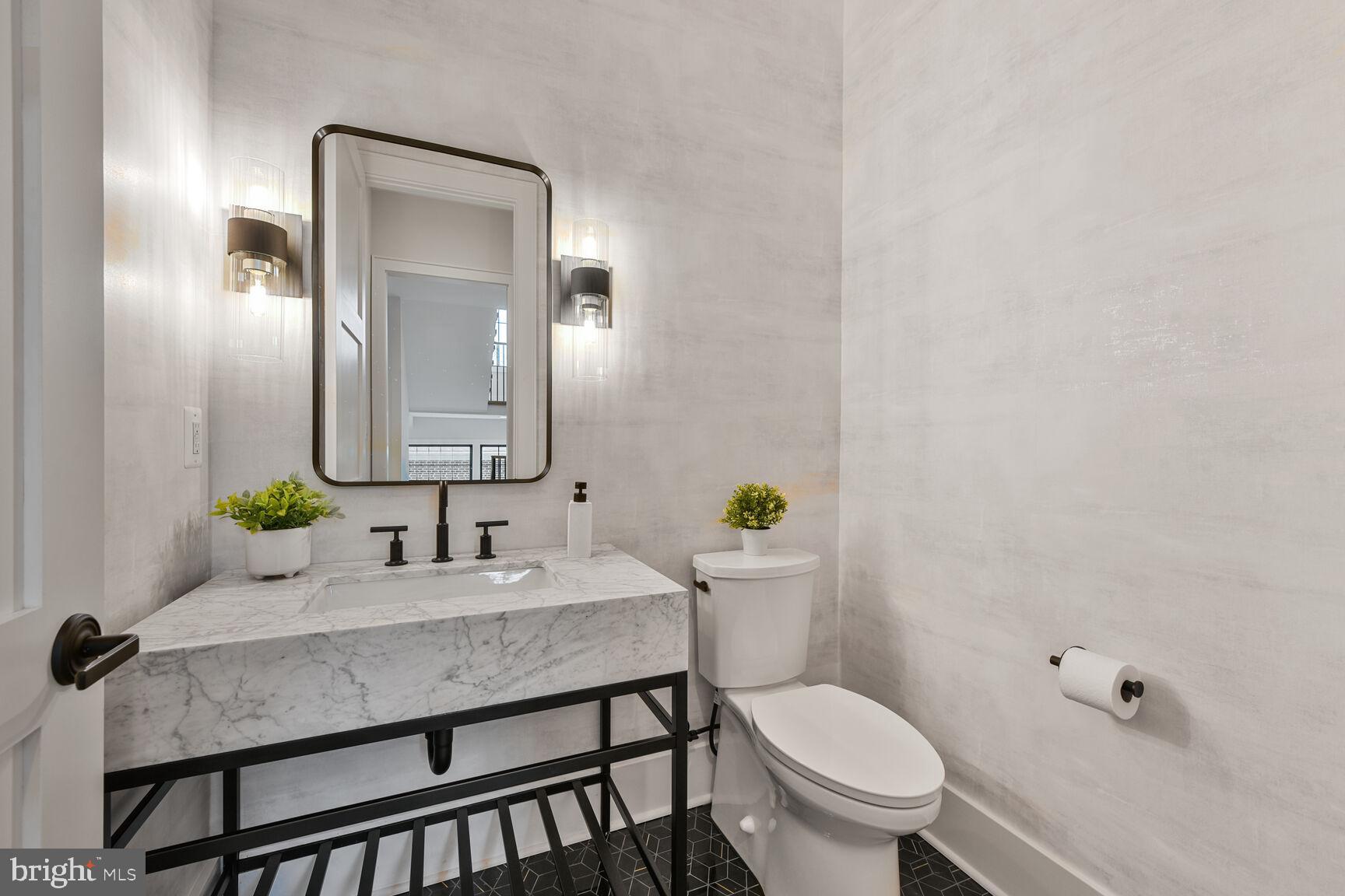 6820 Marbury Road Bethesda, MD 20817 - Photo 8 of 84 Powder Room includes Black Marble Mosaic Flooring