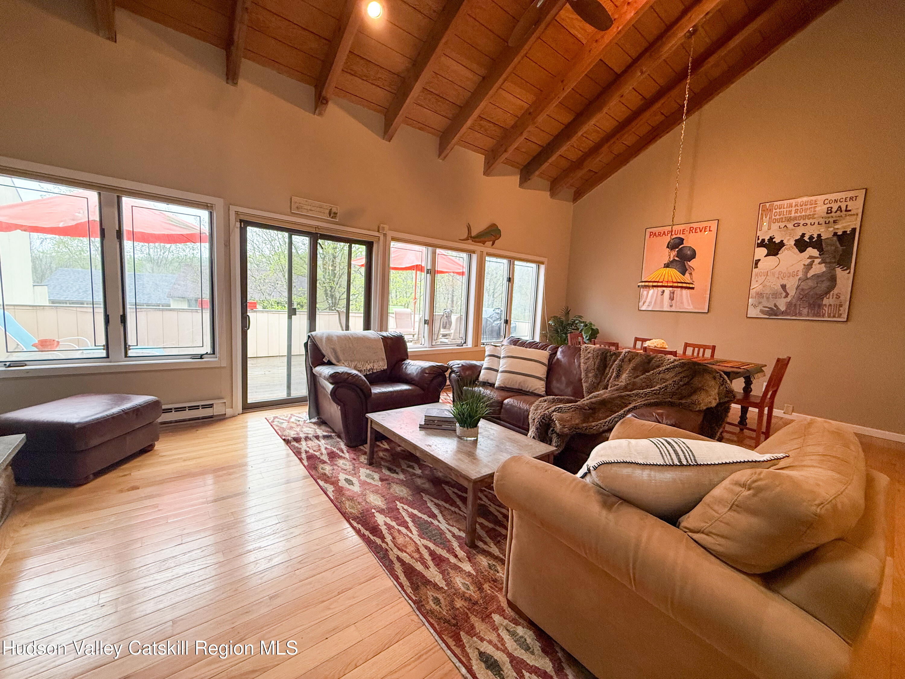 300 Pines Drive, Unit 446 Roxbury, NY 12421 - Photo 11 of 49 a living room with furniture and a large window