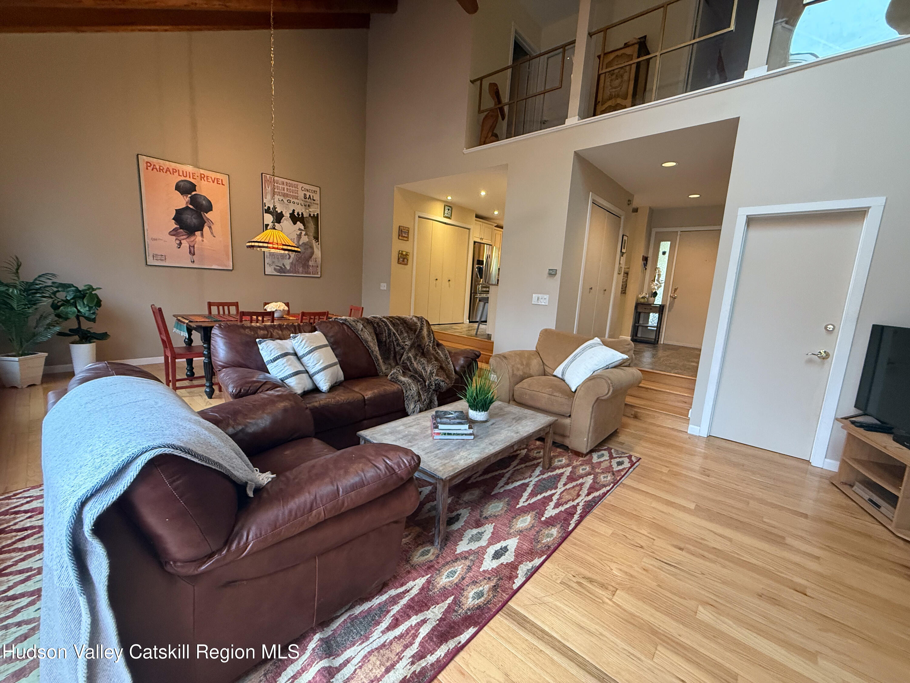 300 Pines Drive, Unit 446 Roxbury, NY 12421 - Photo 13 of 49 a living room with furniture and wooden floor