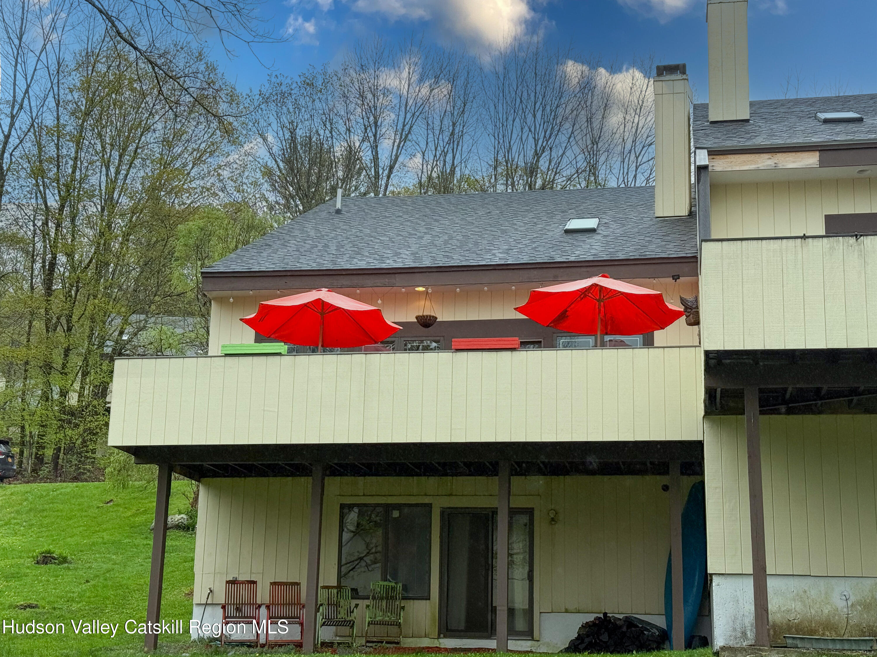 300 Pines Drive, Unit 446 Roxbury, NY 12421 - Photo 2 of 49 a front view of a house with an outdoor space