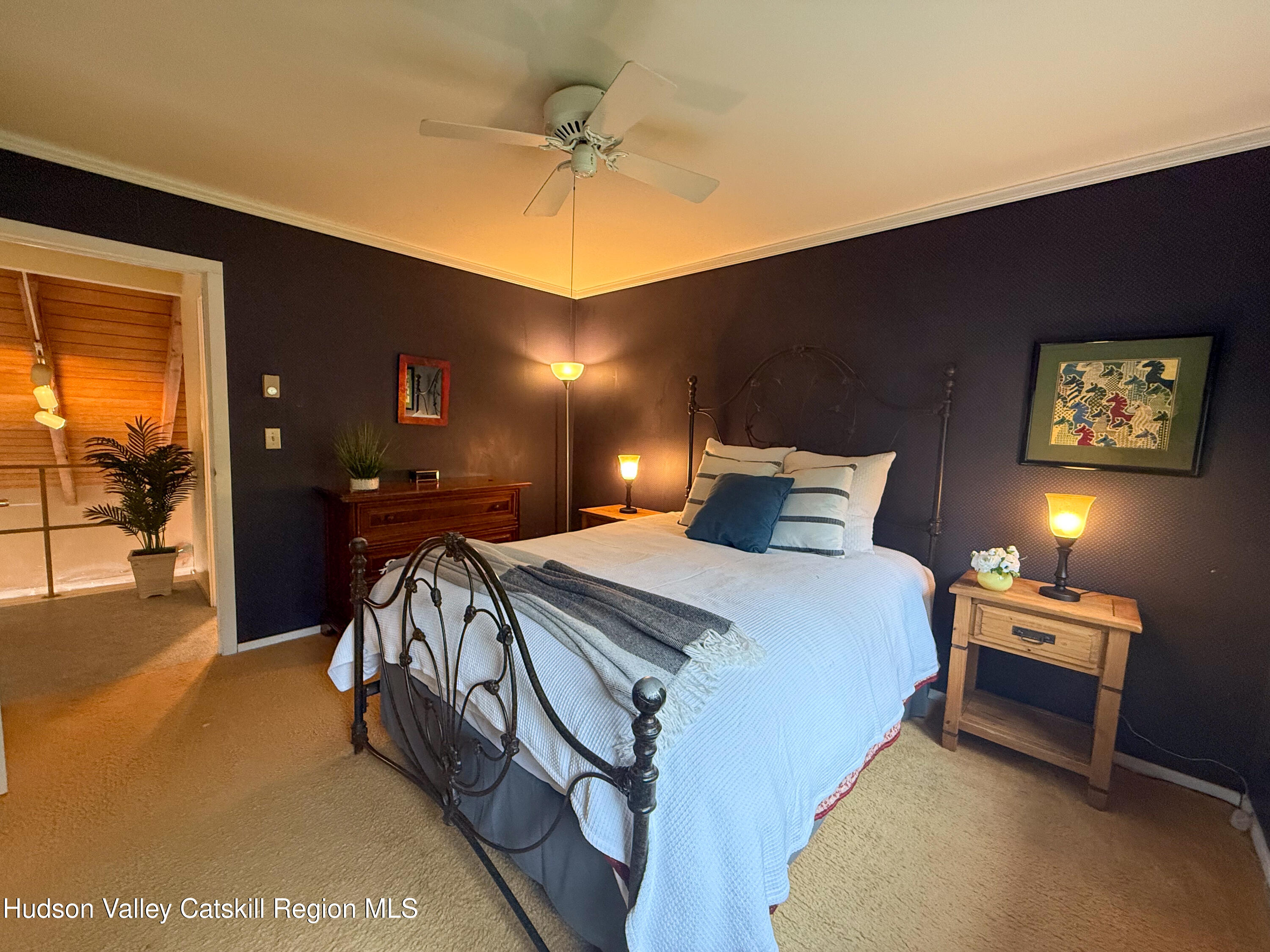 300 Pines Drive, Unit 446 Roxbury, NY 12421 - Photo 22 of 49 a bed room with a bed and a night stand