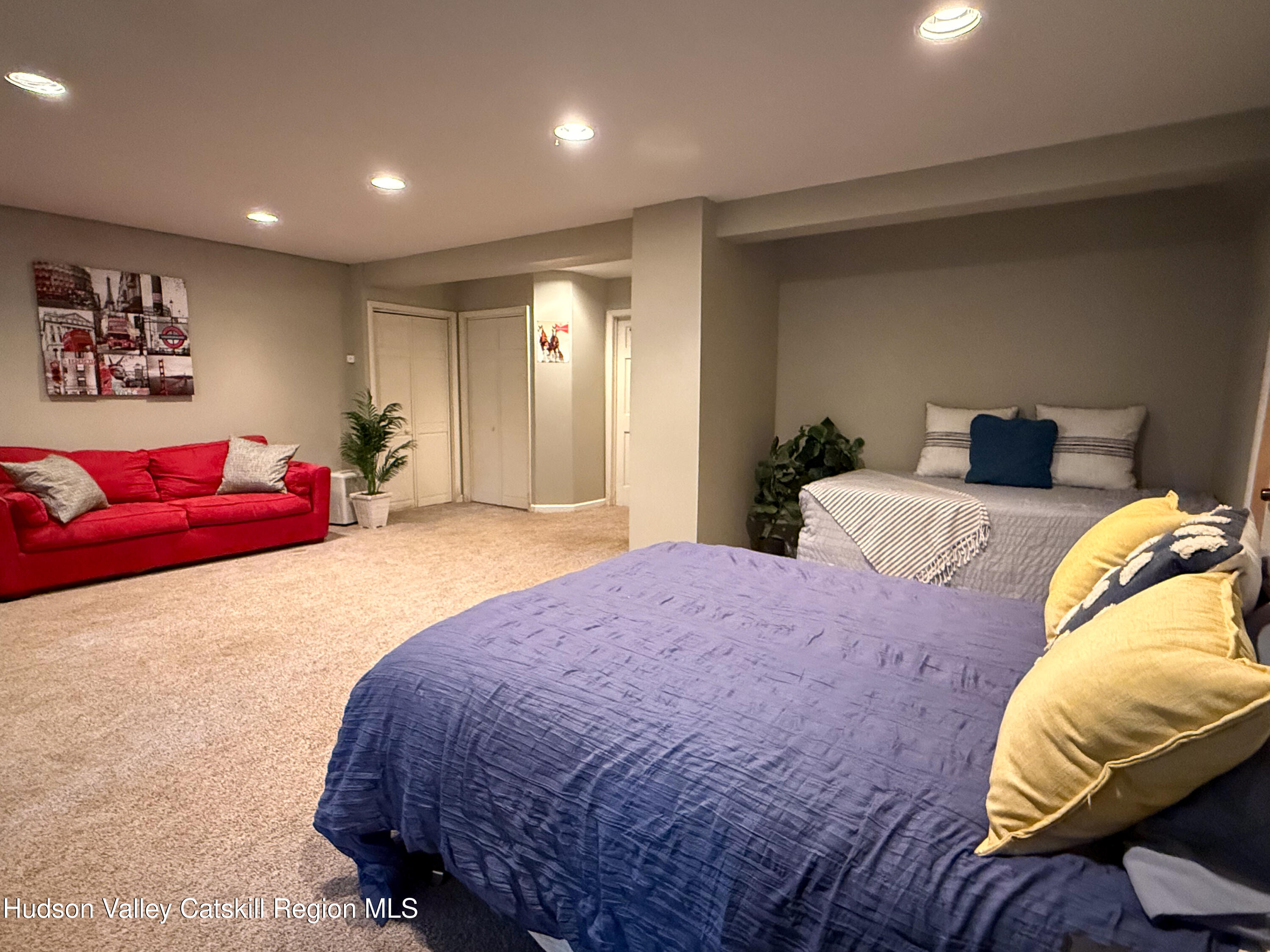 300 Pines Drive, Unit 446 Roxbury, NY 12421 - Photo 37 of 49 a bedroom with a bed and closet