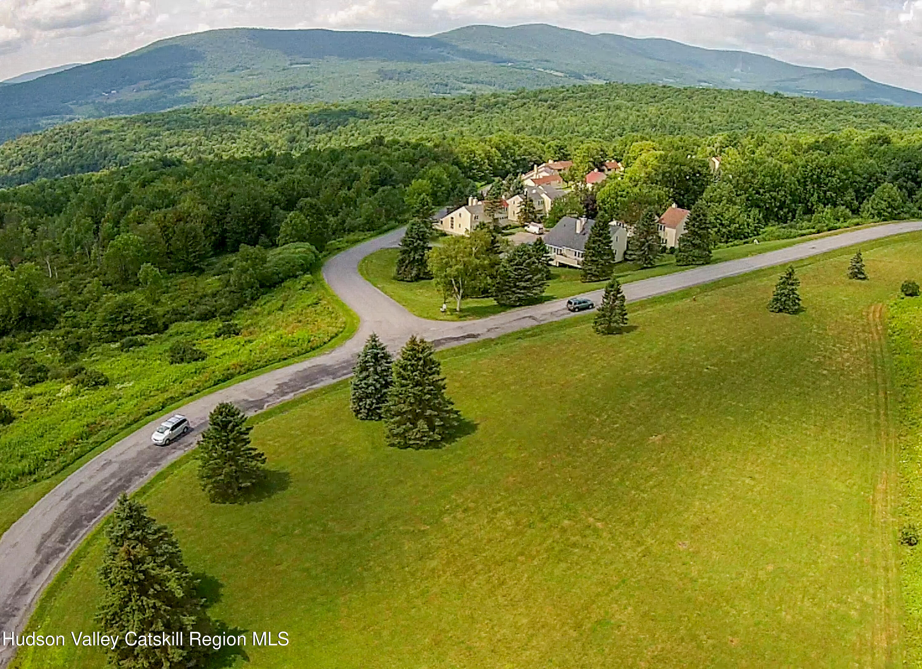 300 Pines Drive, Unit 446 Roxbury, NY 12421 - Photo 44 of 49 a view of a lake with a mountain