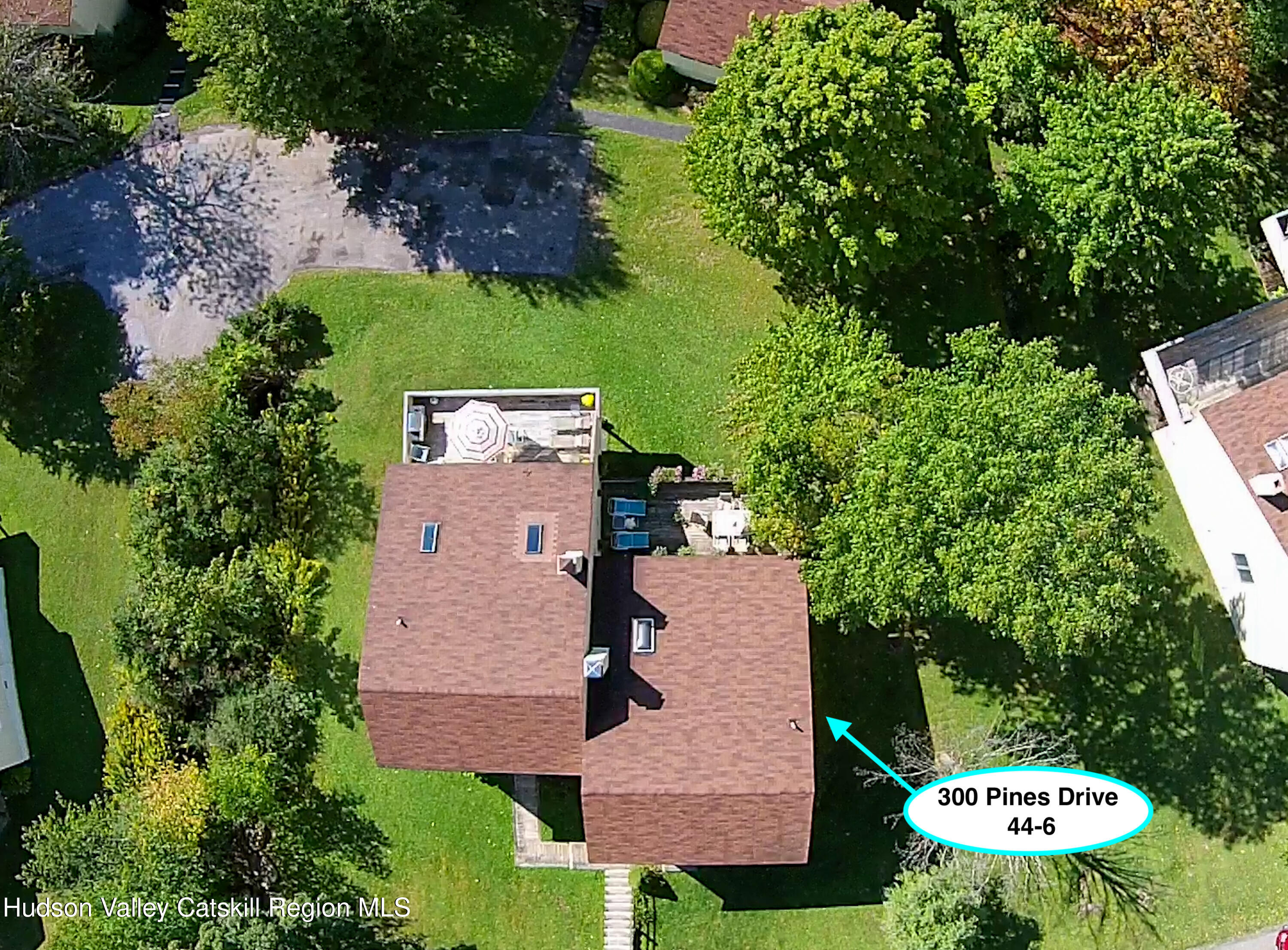 300 Pines Drive, Unit 446 Roxbury, NY 12421 - Photo 47 of 49 an aerial view of a house with yard swimming pool and outdoor seating