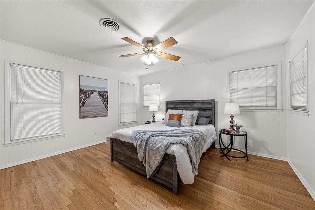 3924 North 30th Street Waco, TX 76708 - Photo 21 of 33 Bedroom 3 is secluded, the largest bedroom, and closet with built-ins for clothing plus motion activated lighting.