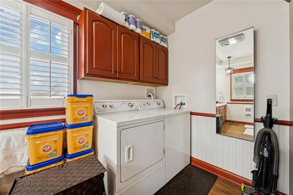 a utility room with dryer and washer