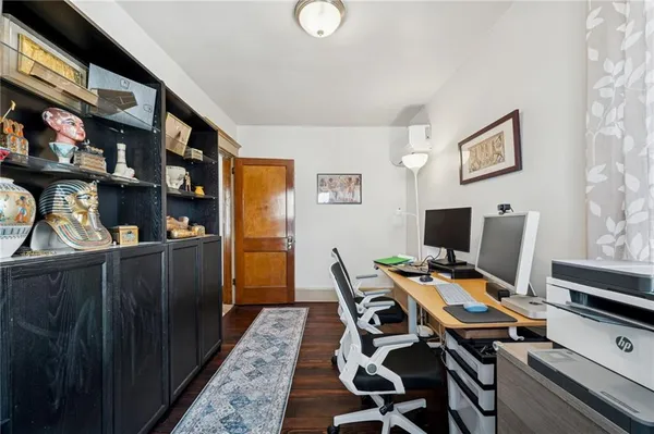 a view of a workspace with furniture