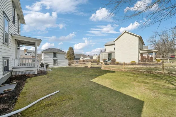 a view of residential houses with outdoor space