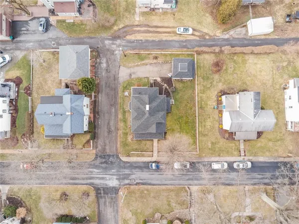 a bathroom with mirror and sink