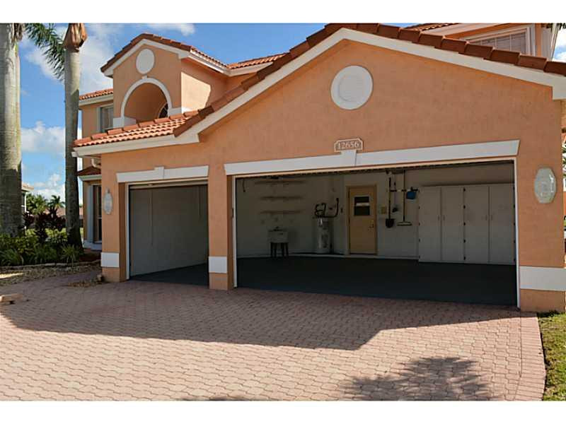12656 Tucano Circle Boca Raton, FL 33428 - Photo 4 of 12 a front view of a house