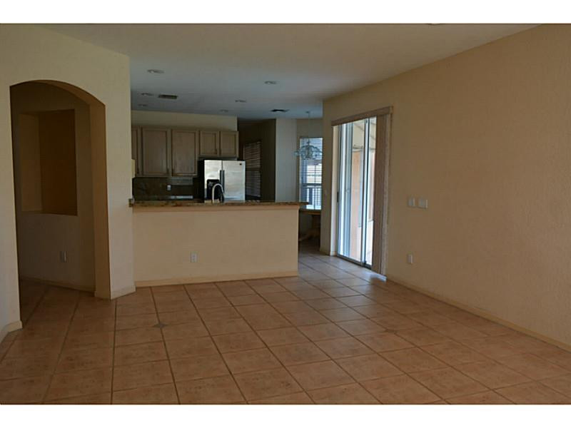12656 Tucano Circle Boca Raton, FL 33428 - Photo 7 of 12 a view of a living room with a wooden floor