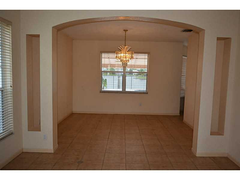12656 Tucano Circle Boca Raton, FL 33428 - Photo 8 of 12 a view of a livingroom with a window