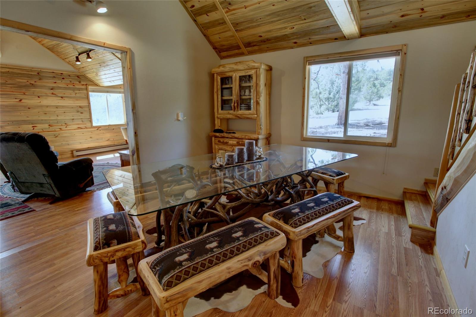 530 Red Feather Road Cotopaxi, CO 81223 - Photo 16 of 46 a picture of a livingroom with furniture and wooden floor