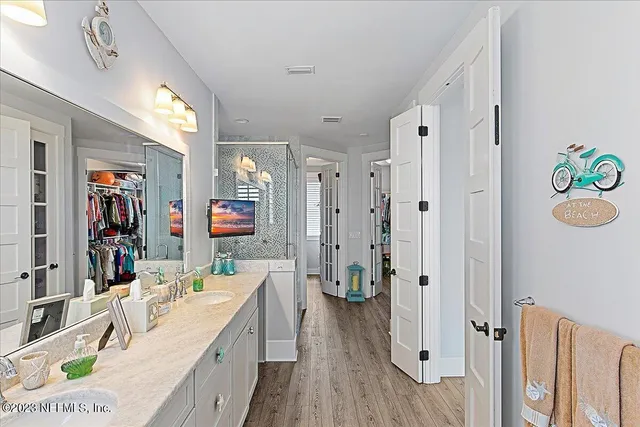 a bedroom with bed and window