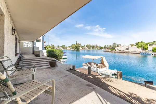 a view of a terrace with sitting area