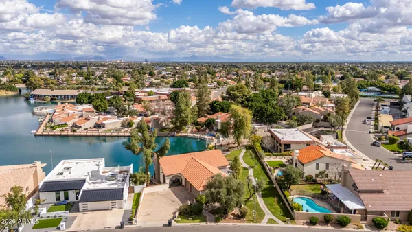 a view of a house with a sink and yard