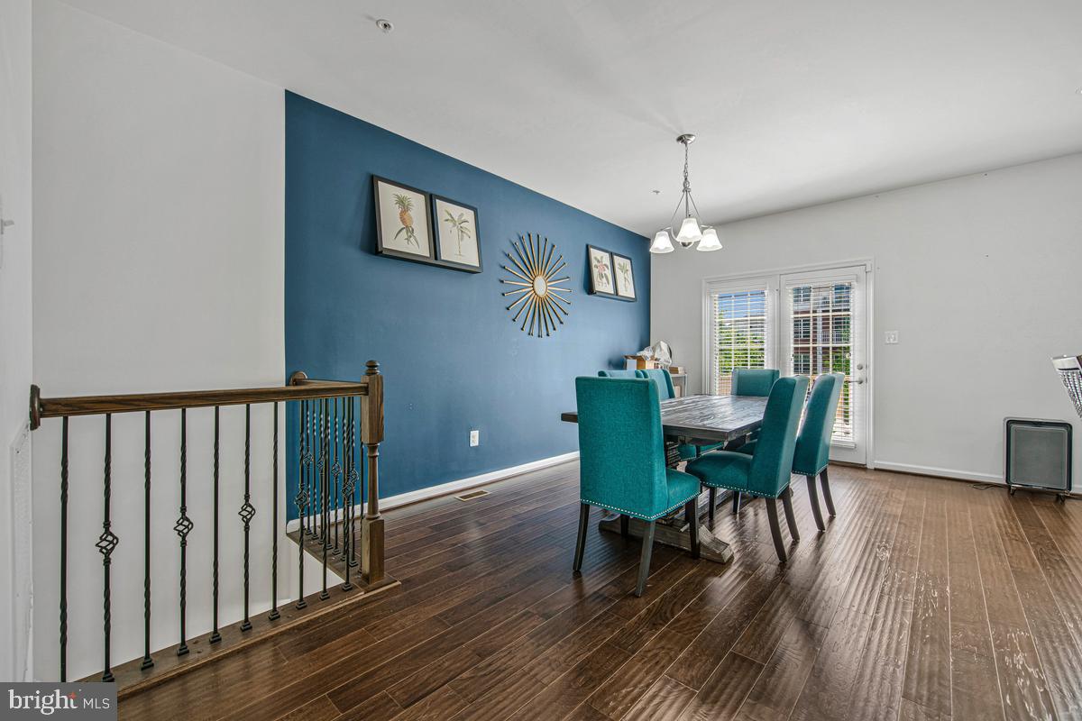 14413 Sandy Ridge Lane Laurel, MD 20707 - Photo 13 of 41 Chic dining space with vibrant accents.