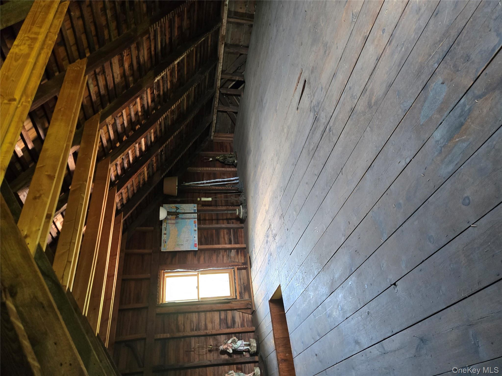 3953 Sound Avenue Riverhead, NY 11901 - Photo 14 of 14 a view of a house with a roof deck