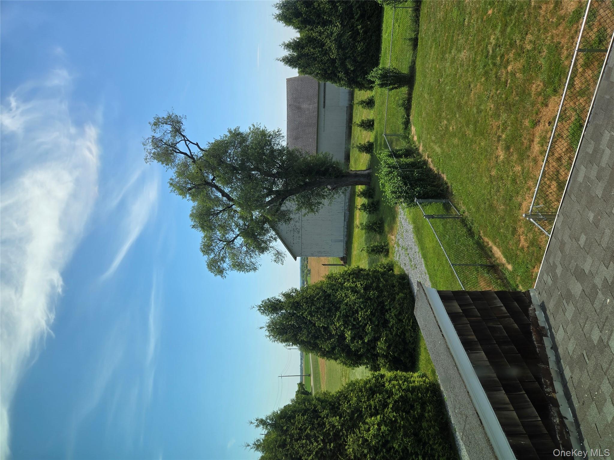 3953 Sound Avenue Riverhead, NY 11901 - Photo 6 of 14 a view of outdoor space and yard